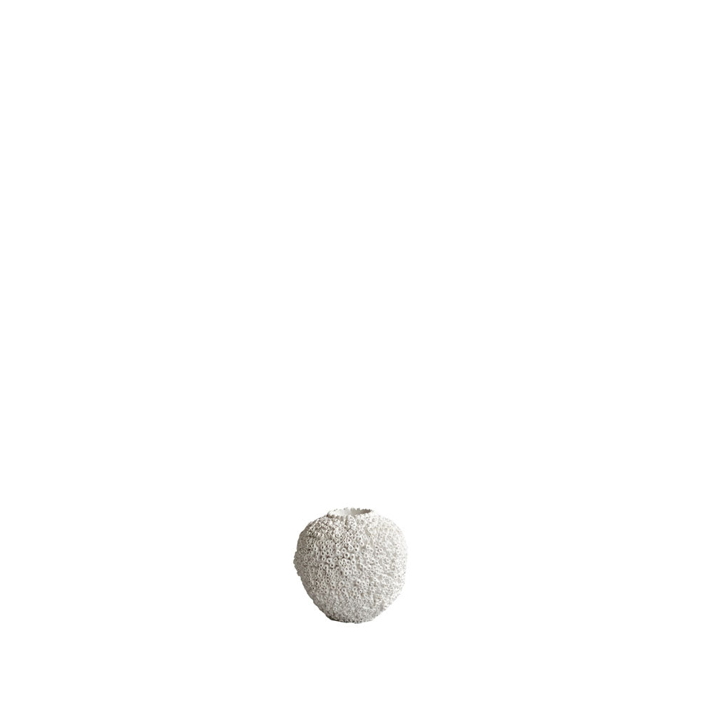 The Beehive Vase by 101 Copenhagen in Birch (16 x 16 cm) features a textured, round ceramic design inspired by Scandinavian minimalism, displayed on a white background with ample empty space.