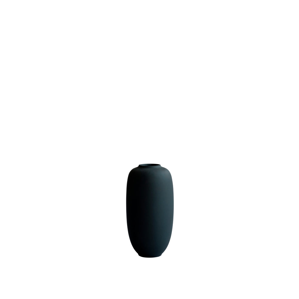 A matte black ceramic Sunao vase with a rounded, elongated body and a small cylindrical neck, centered against a solid white background.