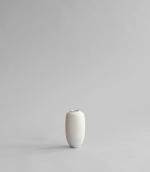 White / Birch Sunao ceramic vase on a light gray background to be styled with faux flowers and foliages 
